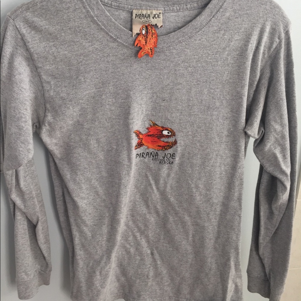 A long sleeve grey shirt